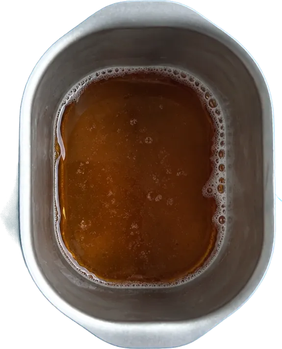 Nel settimo contenitore mettete 100 g di birra scura e 5 g di miele.